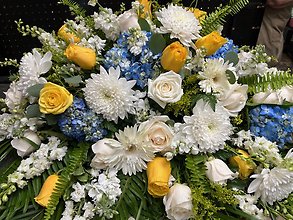 A ray of sunshine casket spray