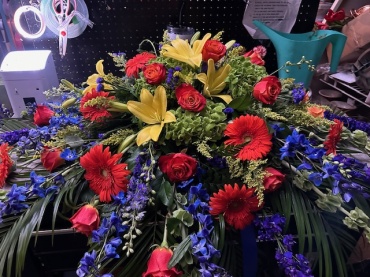 Bold and Bright casket spray